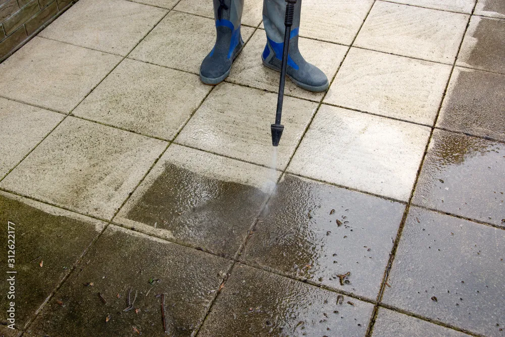 Driveway and paver pressure cleaning in Parkland, Broward County — restored color and joints